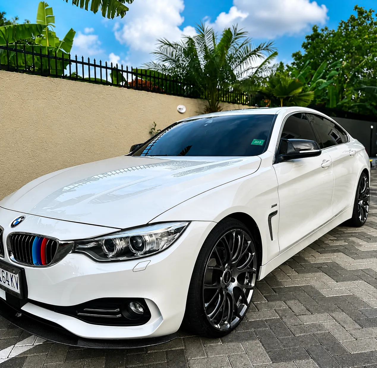 White BMW with a glossy ceramic coated finish